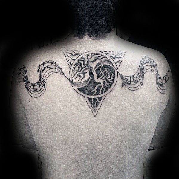 Distinctive male music staff tattoo designs yin yang upper back