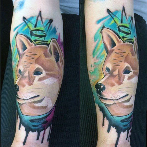 Dog graffiti tattoo on mans forearm