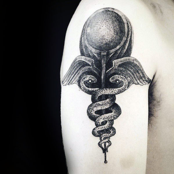 Dotwork male caduceus upper arm tattoos