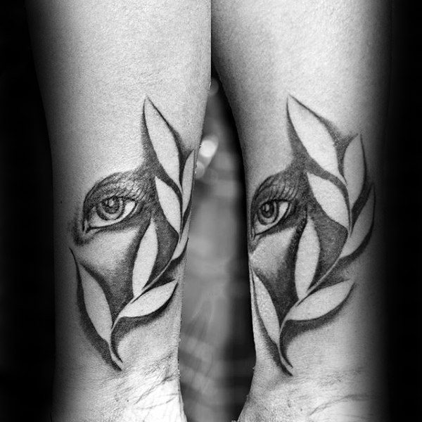 Eye with negative space wheat mens virgo tattoos on wrist