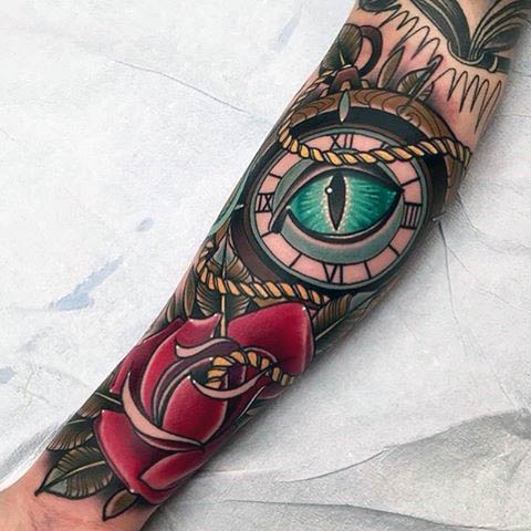 Forearms blue eye and rose neo traditional tattoo