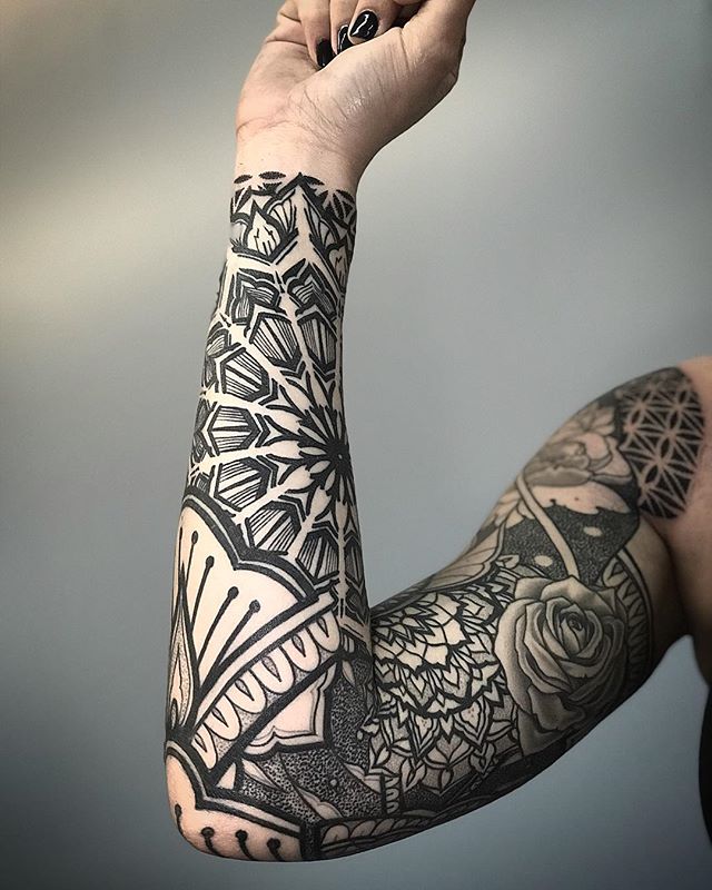 Full Sleeve Black Pattern Tattoo