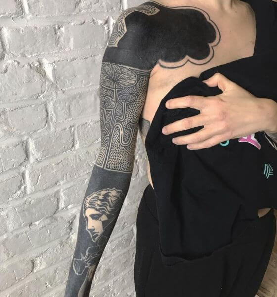 Full Sleeve Solid Blackwork Tattoo