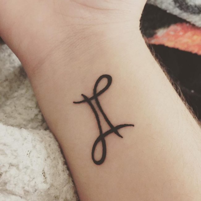 Gemini Sign on Wrist Tattoo