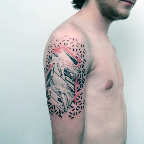 Geometric pattern guy piano upper arm tattoo