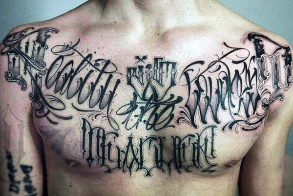 Graffiti script mens upper chest tattoos