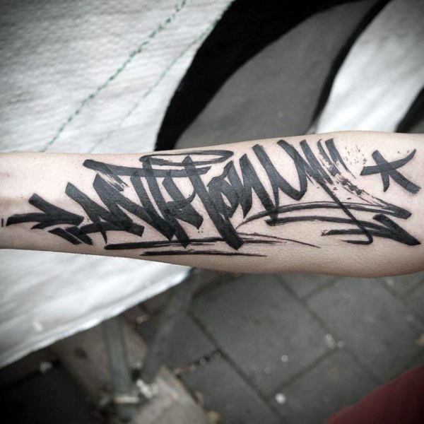 Graffiti tag on forearm tattoo for males