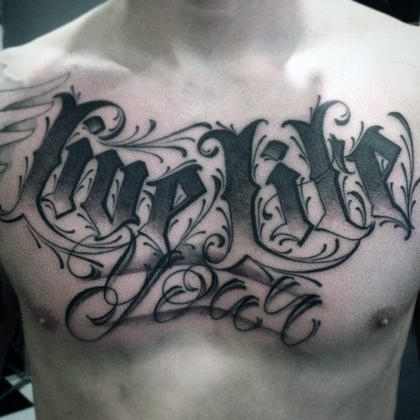 Great lettering tattoo male chest