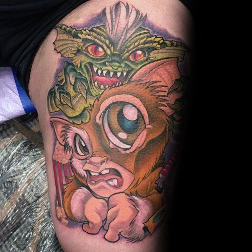 Gremlin male tattoos on thigh
