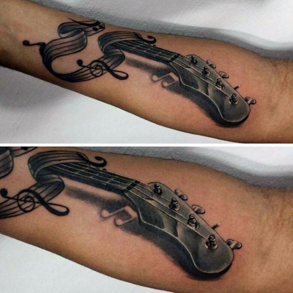 Guitar male music note shaded tattoo design