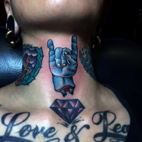 Gus upper neck zombie hand tattoo in blue ink