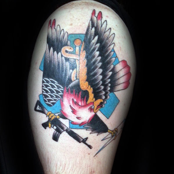 Guys medic star of life with bald eagle upper arm tattoo
