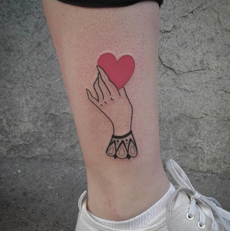 Heart on Sleeve Love Tattoo