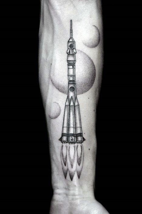 Inner forearm spaceship blasting off into space men tattoo ideas