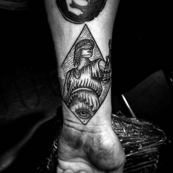 Justice woodcut mens wrist tattoos
