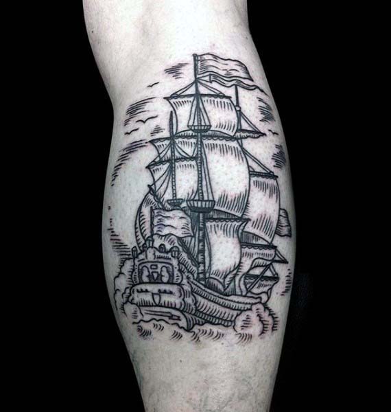 Leg calf woodcut mens sailing ship tattoo Leg calf woodcut mens sailing ship tattoo