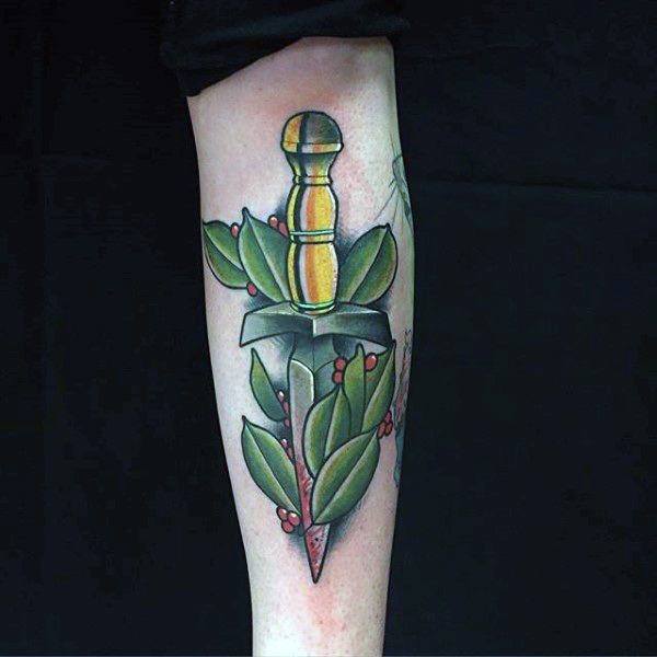 Male forearm dagger and leaves tattoo designs