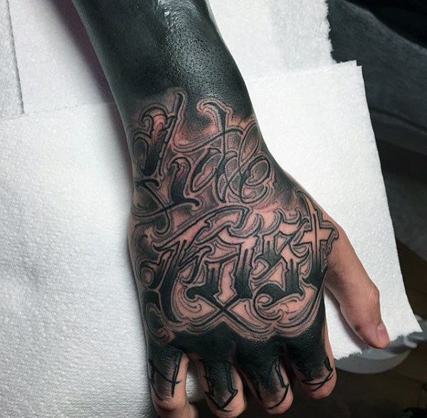 Male hands pretty lettering tattoo