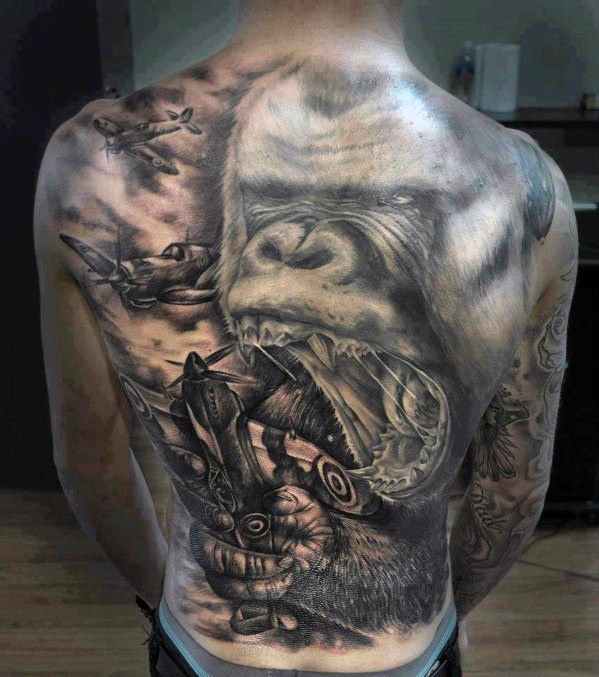 Male with cool king kong tattoo design full back