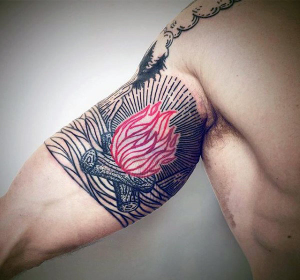 Man with line art camp fire tattoo on bicep
