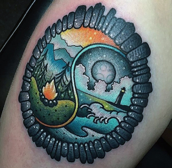Man with stormy sea and forest scene stylized leg tattoo