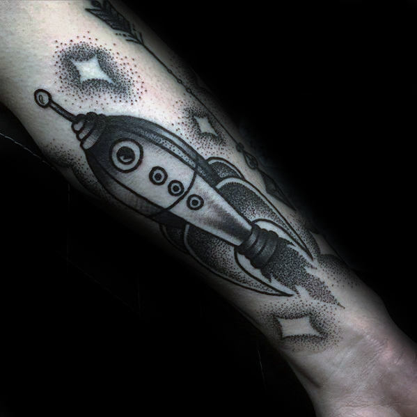 Masculine dotwork spaceship forearm tattoo for guys