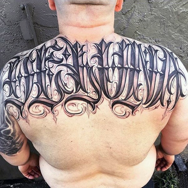 Mens back perfect lettering tattoo