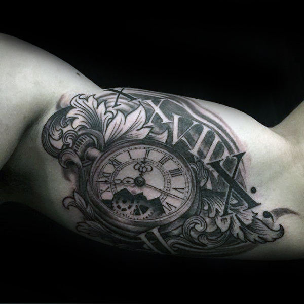 Mens roman numeral filigree pocket watch bicep tattoo on male