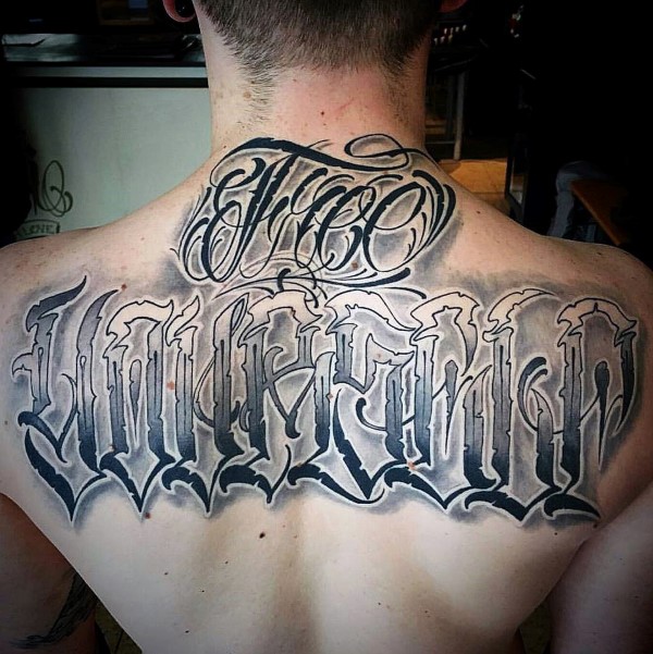 Modern male script upper back tattoos with shaded lettering