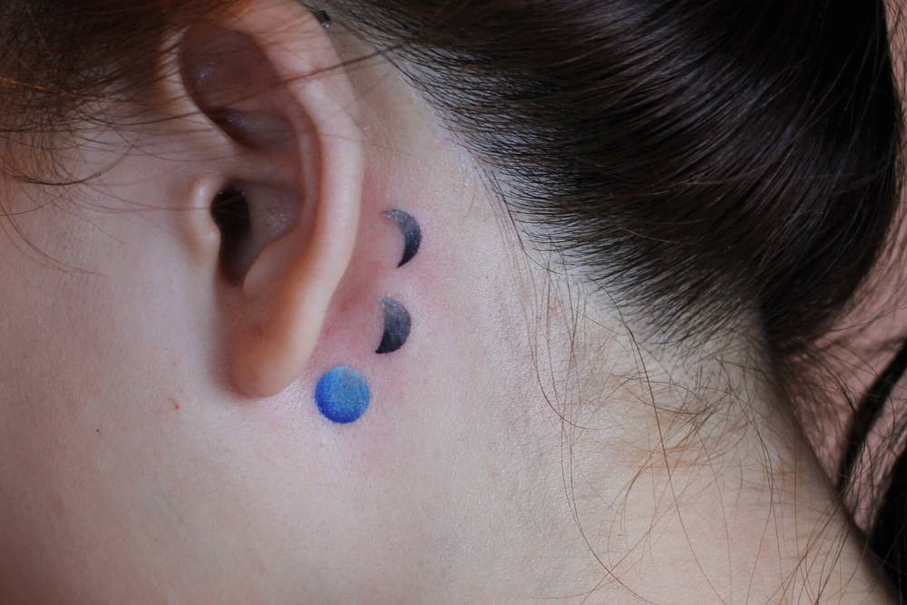 Moon Phases Tattoo Behind The Left Ear