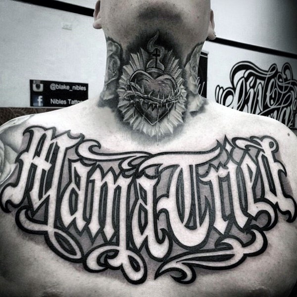 Mother script guys chest tattoo