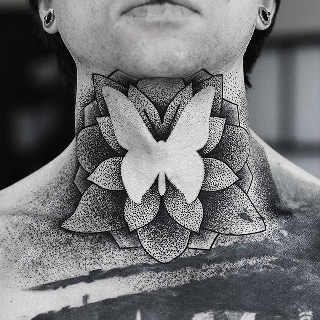 Negative Space Dotwork Style Lotus Flower And Butterfly Tattoo