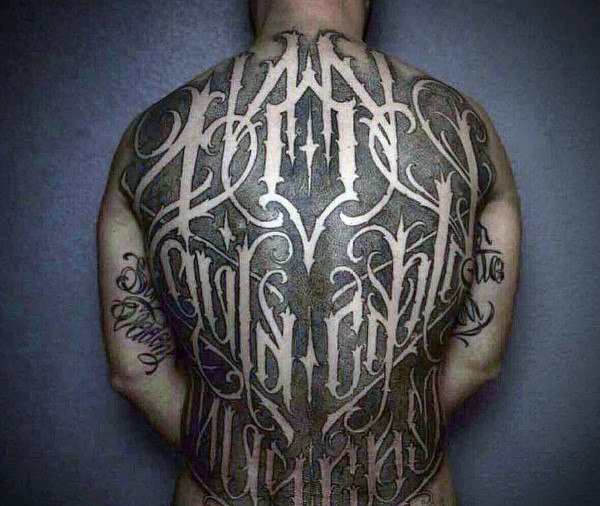 Negative space full back masculine guys script tattoos