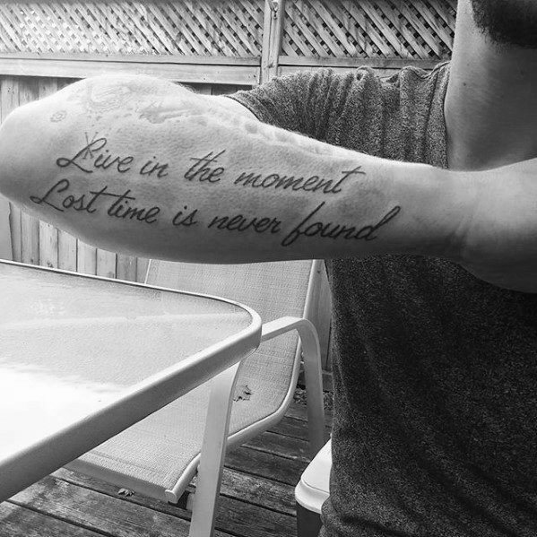Outer forearm live in the moment male quote tattoos