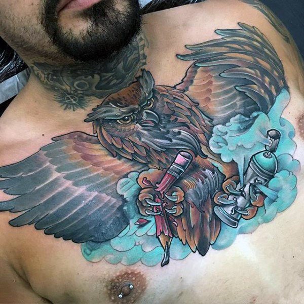 Owl holding spray paint can and pencil graffiti mens chest tattoo