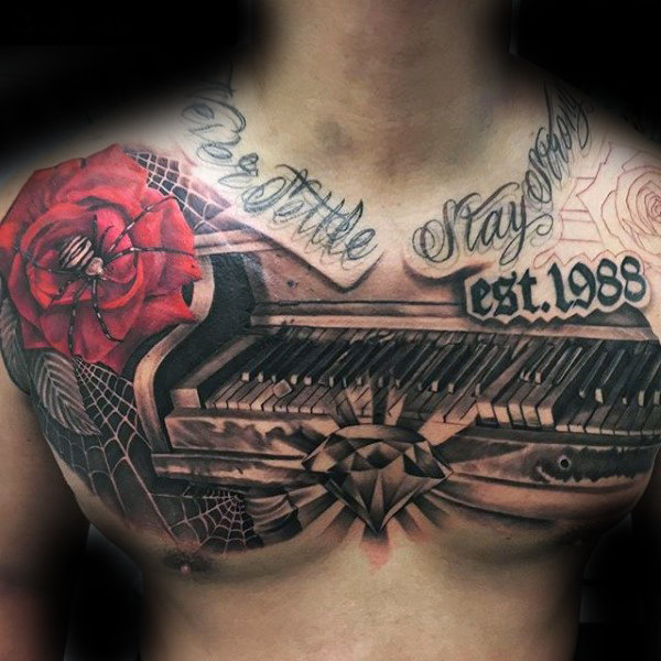 Piano upper chest tattoo with shaded design