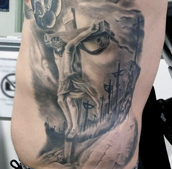 Religious jesus face cross optical illusion rib cage side tattoo