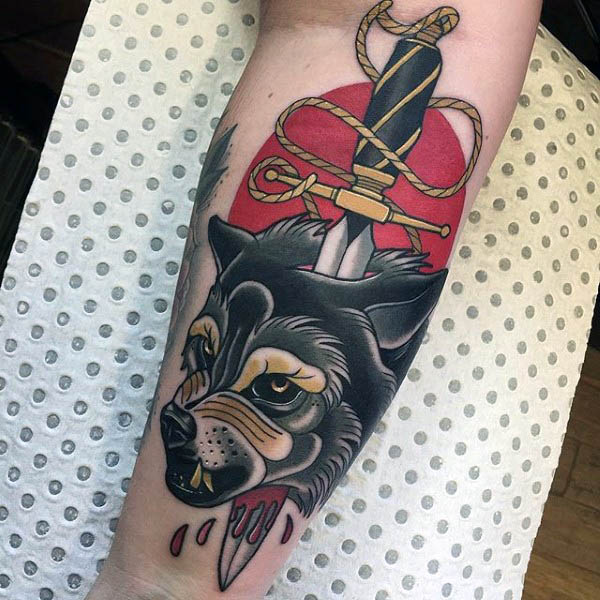 Roped dagger piercing hound neo traditional tattoo mens forearm Roped dagger piercing hound neo traditional tattoo mens forearm