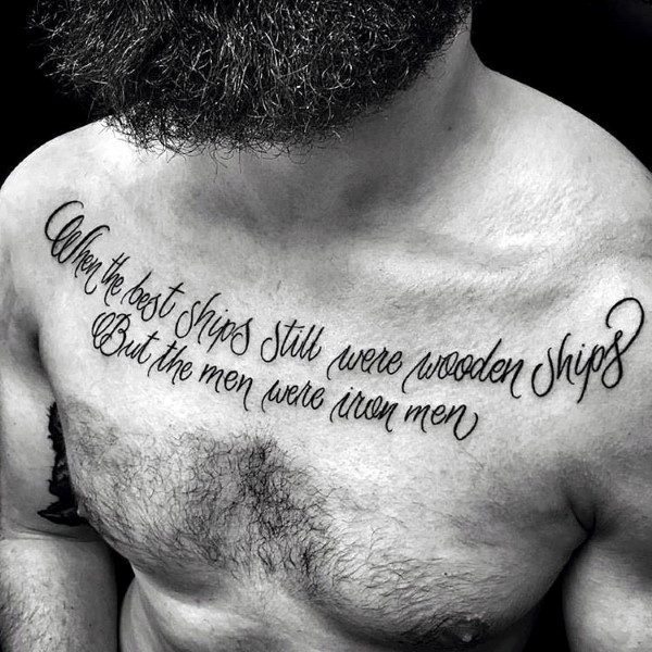 Script cursive chest tattoo