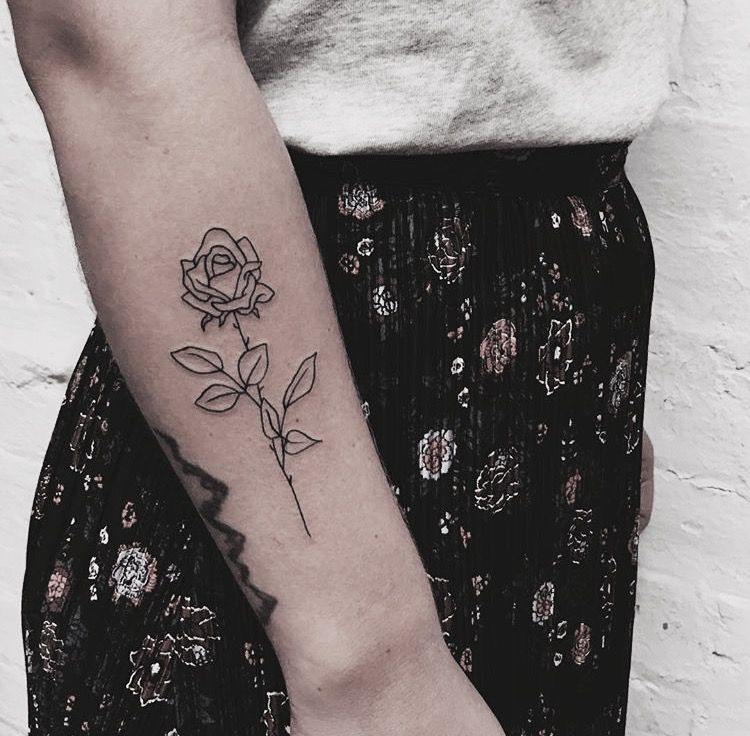 Simple Black Outline Rose Tattoo On The Forearm Simple Black Outline Rose Tattoo On The Forearm