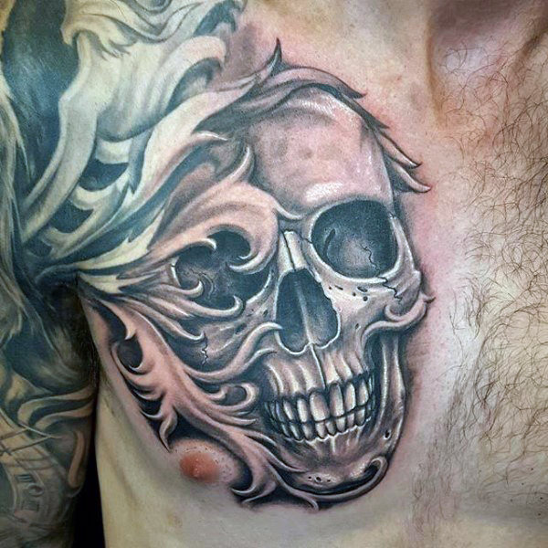 Skull filigree chest tattoo for males Skull filigree chest tattoo for males