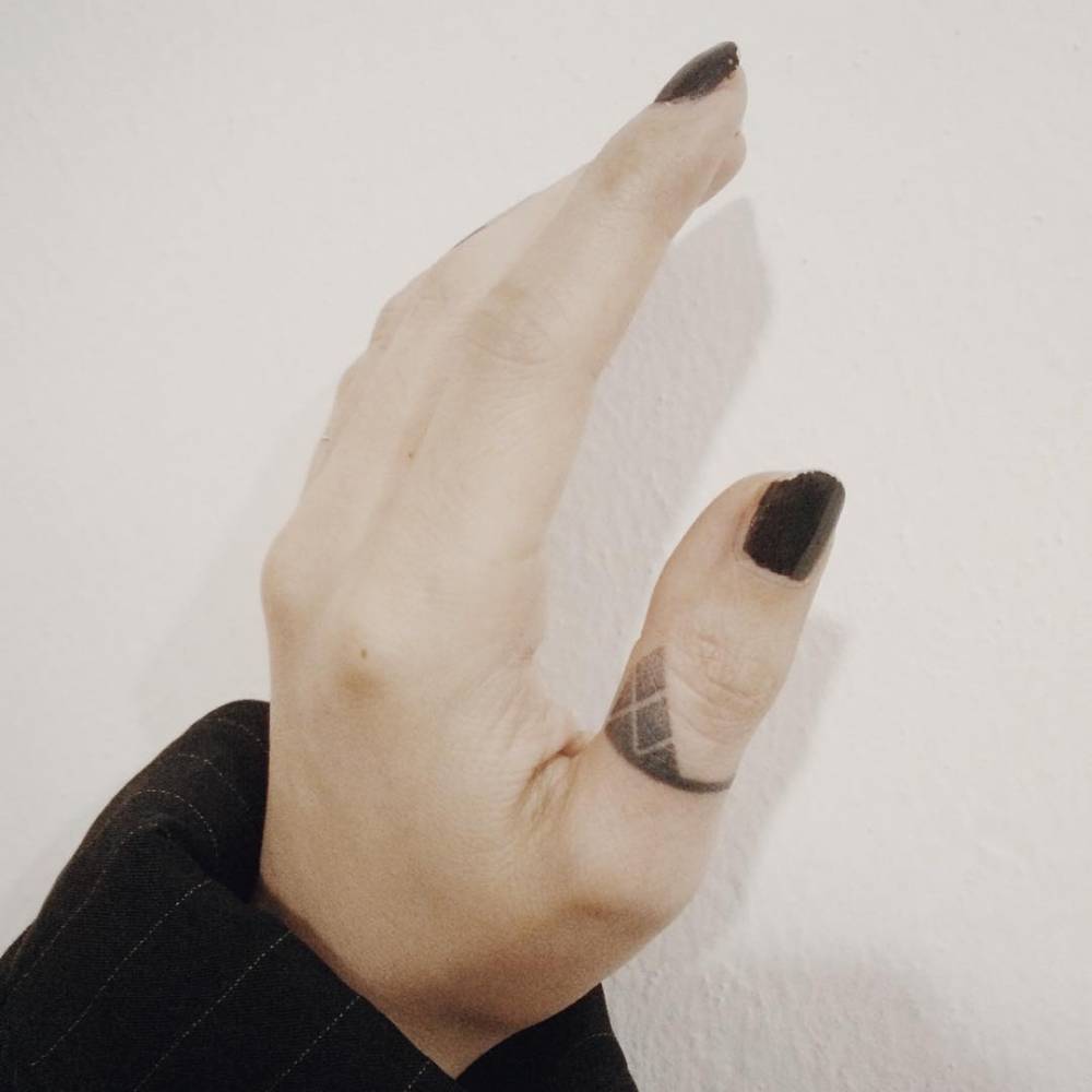 Small Dotwork Ornament Tattoo On The Finger