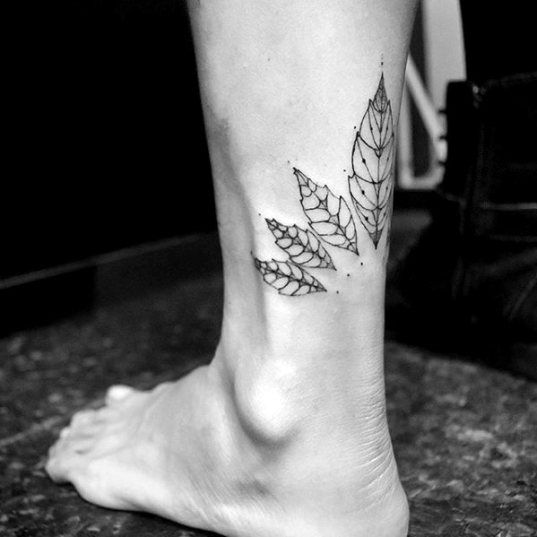 Small back of lower leg nature leaves tattoo
