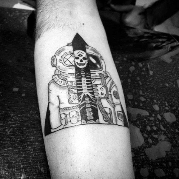 Smiling skeleton tattoo on forearm male