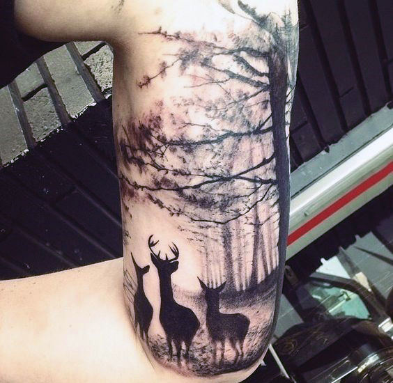 Stylist black ink deer family in forest half sleeve tattoo on male