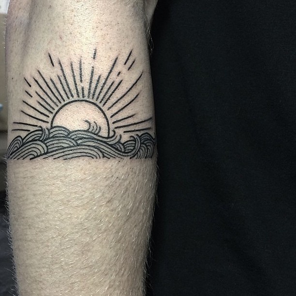 Sun Behind The Waves Tattoo