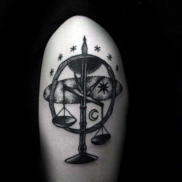 Sun and moon libra tattoo on upper arms