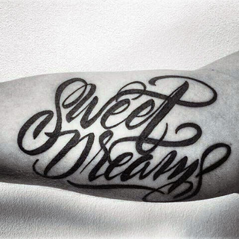 Sweet dreams lettering tattoo on arms