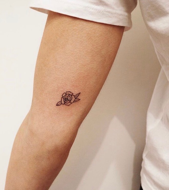 Tiny Black Rose Tattoo On The Inner Arm Tiny Black Rose Tattoo On The Inner Arm