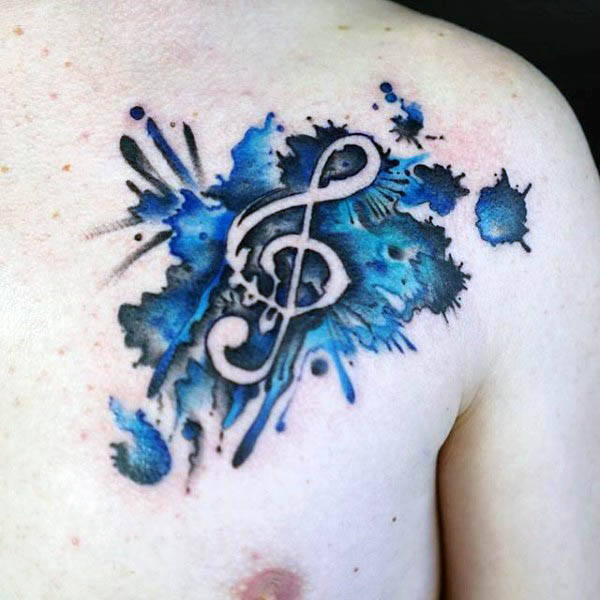 Watercolor blue and black ink treble clef mens upper chest tattoo Watercolor blue and black ink treble clef mens upper chest tattoo